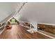 A spacious bonus room with wood floors and creative storage space at 2716 N Vine St, Denver, CO 80205
