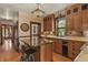 Cozy kitchen with wooden cabinets, granite countertops, and an island at 2716 N Vine St, Denver, CO 80205