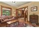 Cozy living room featuring hardwood floors and vintage-style furniture at 2716 N Vine St, Denver, CO 80205