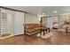Basement living room features a comfortable seating area and exposed brick walls at 2716 N Vine St, Denver, CO 80205