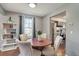 Cozy dining room with hardwood floors and large window at 8160 Washington St # 67, Denver, CO 80229