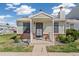 Charming home exterior with a welcoming porch, well-maintained lawn, and lovely curb appeal at 8160 Washington St # 67, Denver, CO 80229