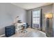 Bright home office with ample natural light, desk space, and plenty of room for productivity at 8160 Washington St # 67, Denver, CO 80229