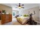 Cozy bedroom with a ceiling fan and exercise equipment at 2456 S Marion St, Denver, CO 80210