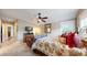 Spacious bedroom with a king-size bed and sitting area at 2456 S Marion St, Denver, CO 80210