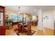 Dining area with hardwood floors and a view into the kitchen at 2456 S Marion St, Denver, CO 80210