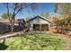 Backyard featuring mature lawn and established landscaping, perfect for outdoor enjoyment at 3336 N Saint Paul St, Denver, CO 80205
