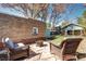 Charming backyard patio with seating, perfect for enjoying the outdoors at 3336 N Saint Paul St, Denver, CO 80205