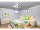 Charming bedroom with a bright decor features new flooring, fresh paint and cozy ambiance at 3336 N Saint Paul St, Denver, CO 80205