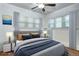 Bright bedroom with ample natural light features modern decor and a ceiling fan at 3336 N Saint Paul St, Denver, CO 80205
