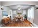 Bright dining room featuring hardwood floors, a modern ceiling fan, and lots of natural light at 3336 N Saint Paul St, Denver, CO 80205