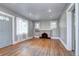 Spacious living room showcasing hardwood floors, fireplace, and neutral paint colors at 3336 N Saint Paul St, Denver, CO 80205