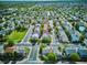 An aerial view of a meticulously planned neighborhood with green spaces and tree-lined streets near the Denver Tech Center at 1169 S Alton Ct, Denver, CO 80247