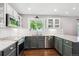 Updated kitchen with stainless steel appliances, granite countertops, and subway tile backsplash at 1169 S Alton Ct, Denver, CO 80247
