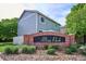 Community signage surrounded by lush landscaping creates a welcoming entrance to Alton Park at 1169 S Alton Ct, Denver, CO 80247