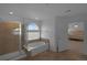 Bathroom with soaking tub, glass shower, and tile floors at 21229 E 50Th Ave, Denver, CO 80249