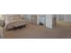 Bright bedroom with sitting area, soft carpet, and neutral color scheme at 21229 E 50Th Ave, Denver, CO 80249