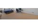 Bright room with a comfortable bed, office space and neutral carpet at 21229 E 50Th Ave, Denver, CO 80249