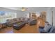 Open-concept living space featuring hardwood floors and lots of natural light at 21229 E 50Th Ave, Denver, CO 80249