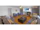 Bright, open living room features hardwood floors, a fireplace, and comfortable seating at 21229 E 50Th Ave, Denver, CO 80249