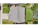 Bird's eye view of a home's roof, yard, and surrounding landscaping, offering a sense of privacy and space at 4064 S Himalaya Way, Aurora, CO 80013
