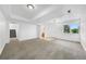 Finished basement with neutral carpet, white walls, trim, and recessed lighting offers versatile living space at 4064 S Himalaya Way, Aurora, CO 80013