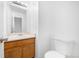 Functional bathroom with a single sink vanity and a toilet, providing essential amenities at 4064 S Himalaya Way, Aurora, CO 80013