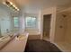 Well-lit bathroom features a soaking tub, separate shower, and ample counter space for added convenience at 4064 S Himalaya Way, Aurora, CO 80013