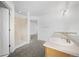 Bright bathroom featuring a shower and double sinks at 4064 S Himalaya Way, Aurora, CO 80013