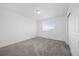 Bedroom featuring neutral carpet and natural light at 4064 S Himalaya Way, Aurora, CO 80013