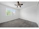 Bedroom featuring a ceiling fan and natural light at 4064 S Himalaya Way, Aurora, CO 80013