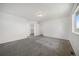 Spacious bedroom features neutral walls, plush carpeting, and a walk-in closet, providing ample storage at 4064 S Himalaya Way, Aurora, CO 80013