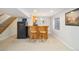 Basement wet bar, features pendant lighting, seating, and ample cabinet space, ideal for entertaining guests at 3305 W 126Th Ave, Broomfield, CO 80020