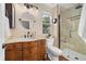 Elegant bathroom with marble vanity, custom cabinets, and a glass-enclosed shower at 3305 W 126Th Ave, Broomfield, CO 80020