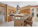 Well-equipped kitchen with stainless steel appliances, granite countertops, and barstool seating at 3305 W 126Th Ave, Broomfield, CO 80020