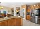 Updated kitchen with granite countertops, stainless steel appliances and a convenient pantry at 3305 W 126Th Ave, Broomfield, CO 80020
