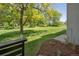 Expansive backyard featuring well-maintained lawn and mature trees, creating a serene outdoor space at 6505 Kalua Rd # 104B, Boulder, CO 80301