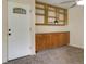 Inviting foyer featuring built-in shelving and storage cabinets at 6505 Kalua Rd # 104B, Boulder, CO 80301