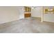 Open-concept living area with modern finishes and ample natural light from the entryway at 6505 Kalua Rd # 104B, Boulder, CO 80301