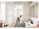 En suite bathroom with modern fixtures, including a sleek vanity and a view into the bedroom at 815 S Jersey St, Denver, CO 80224