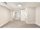 This bedroom features plush carpeting, mirrored closet doors, and soft, neutral walls at 815 S Jersey St, Denver, CO 80224
