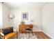 Bright home office features stylish desk, chair, and natural light to create a workspace at 815 S Jersey St, Denver, CO 80224