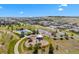 Aerial view of community park with playground, pool, and picnic area at 12214 Stone Timber Ct, Parker, CO 80134