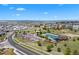 Aerial view of neighborhood amenities including a pool, playground and parking at 12214 Stone Timber Ct, Parker, CO 80134