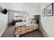 Bright bedroom with a large window, comfortable bed, and ample closet space at 12214 Stone Timber Ct, Parker, CO 80134