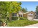 A charming single-Gathering home with a beautifully landscaped front yard and welcoming curb appeal at 10050 Eagle Valley Way, Highlands Ranch, CO 80129