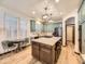 Bright kitchen with island, modern appliances, pendant lighting, and a breakfast nook with natural light at 10050 Eagle Valley Way, Highlands Ranch, CO 80129