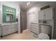 Clean bathroom with shower, toilet and vanity at 8845 S Brentwood St, Littleton, CO 80128