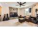 Finished basement with stone fireplace and seating area at 12626 N 1St St, Parker, CO 80134
