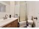 Clean bathroom with shower and vanity at 12626 N 1St St, Parker, CO 80134
